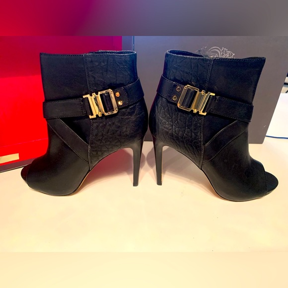 Vince Camuto black leather booty size 9.5 with side zipper, gold buckle detail - Picture 1 of 5